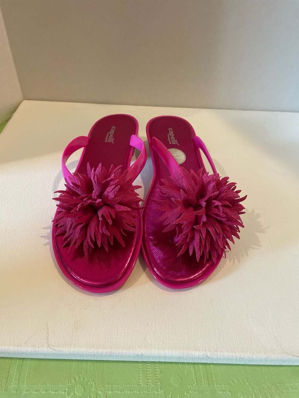 Capelli New York Hot Pink Flip Flops. Large Floral Pom Pom. Size 8.